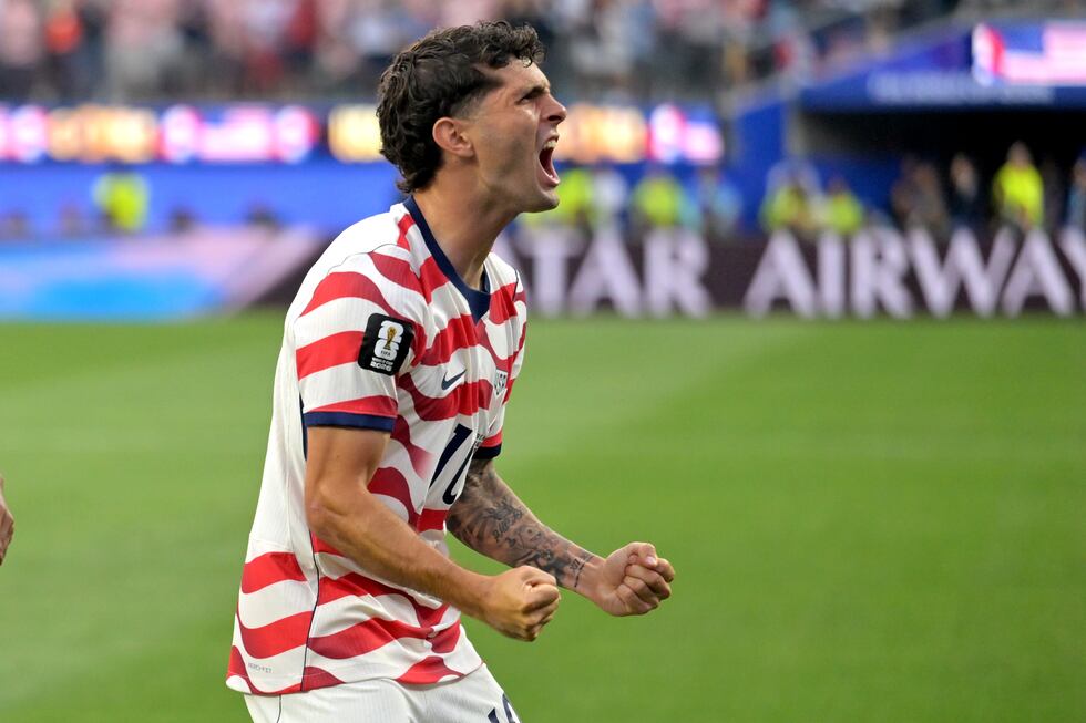 United States' Christian Pulisic celebrates after an own goal by Paraguay's Damian Bobadilla...