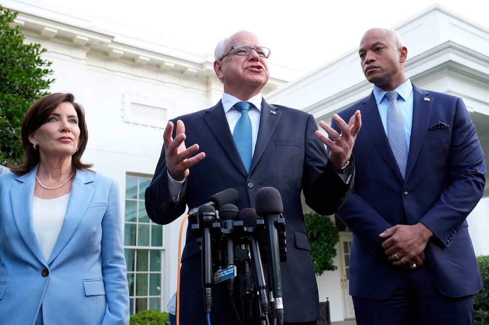 FILE - Minnesota Gov. Tim Walz, center, standing with New York Gov. Kathy Hochul, left, and...
