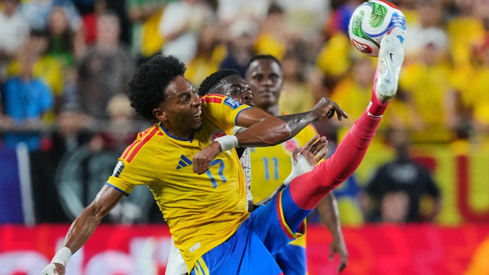 Colombia's Johan Mojica (17) kicks the ball over Ghana's Inaki Williams for the ball during...