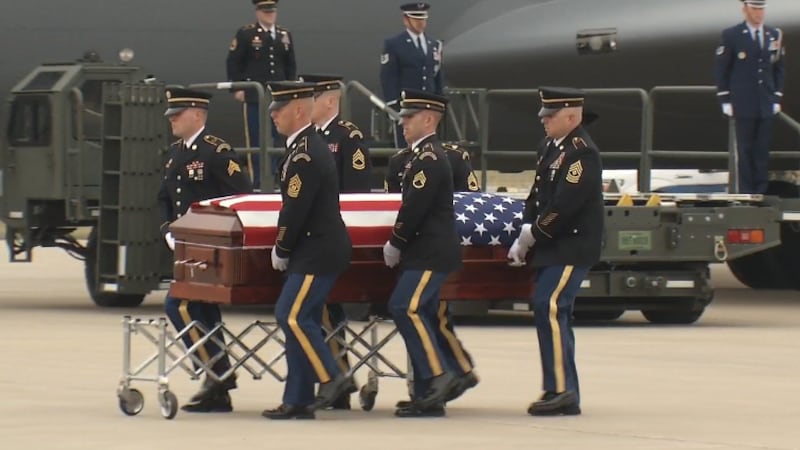 The remains of the fallen Iowa National Guard soldiers are returned in a solemn transfer at...